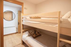 A bed or beds in a room at Busgosu, casa a 300 m de la playa de Poo VV-993-AS