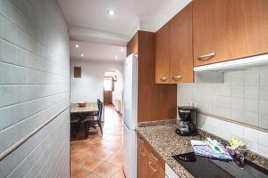 A kitchen or kitchenette at Busgosu, casa a 300 m de la playa de Poo VV-993-AS