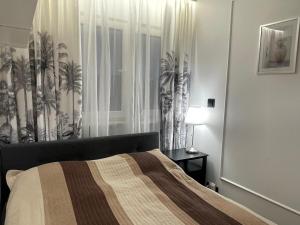 Posteľ alebo postele v izbe v ubytovaní Happy Apartaments