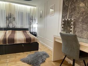 Posteľ alebo postele v izbe v ubytovaní Happy Apartaments