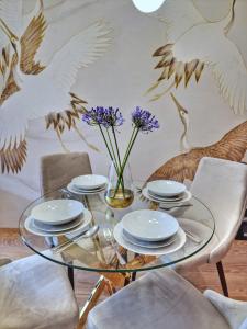 Posezení v ubytování Lux Lake - Apartament z ogrodem nad Jeziorem + 4 fotografie