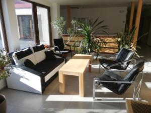 Posedenie v ubytovaní Rodinný wellness hotel U Langrů