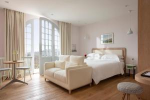 Кровать или кровати в номере Auberge La Coste