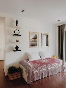 Postel nebo postele na pokoji v ubytování White Lotus - Luxury apartment