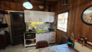 Kuchyň nebo kuchyňský kout v ubytování Guest House Kldiashvili