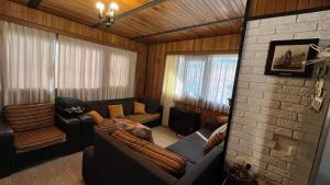 Posezení v ubytování Guest House Kldiashvili