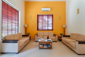Istumisnurk majutusasutuses De Mandarin Beach Resort Suites & Villas, Candolim