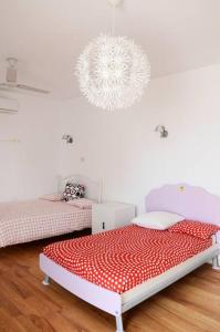 Postel nebo postele na pokoji v ubytování Villa Branca - Seafront Villa Mindelo