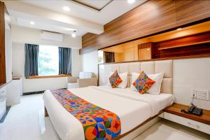 Posezení v ubytování FabHotel The Nashik Inn - Nr Vijay Mamta Theatre, Nashik Road