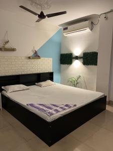 Postel nebo postele na pokoji v ubytování perfect homestay 1bhk