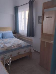 Postel nebo postele na pokoji v ubytování Sweet Home