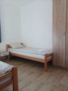 Postel nebo postele na pokoji v ubytování Kuca LARA 2 Banja Vrujci