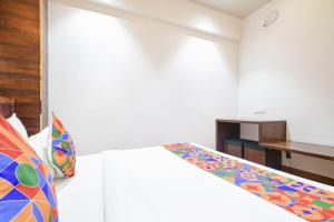 Krevet ili kreveti u jedinici u okviru objekta FabHotel Awadhvue
