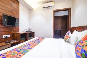 Krevet ili kreveti u jedinici u okviru objekta FabHotel Awadhvue