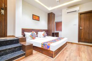 Krevet ili kreveti u jedinici u okviru objekta FabHotel Awadhvue