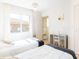Postel nebo postele na pokoji v ubytování Apartment Côte Sud-3 by Interhome