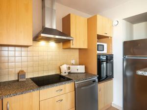 Kuchyň nebo kuchyňský kout v ubytování Apartment Côte Sud-3 by Interhome