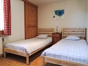 Postel nebo postele na pokoji v ubytování Apartment Val Neige Apt- 12 by Interhome + 16 fotografií
