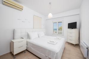 Ένα ή περισσότερα κρεβάτια σε δωμάτιο στο Villa Pelagos Blue +44 φωτογραφίες