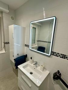 Koupelna v ubytování Flori'Home
