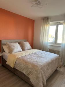 Postel nebo postele na pokoji v ubytování Flori'Home