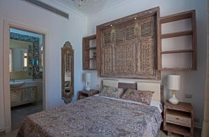 Кровать или кровати в номере Soma Bay Seafront Luxury Appartement