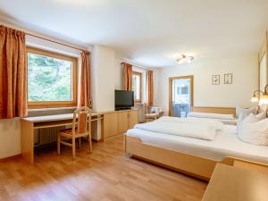Postel nebo postele na pokoji v ubytování Apartment Nr- 18 by Interhome