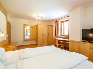 Postel nebo postele na pokoji v ubytování Apartment Nr- 18 by Interhome