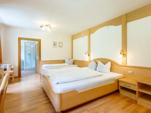 Postel nebo postele na pokoji v ubytování Apartment Nr- 18 by Interhome