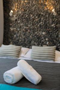 Letto o letti in una camera di Ichor Suites