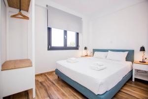 Voodi või voodid majutusasutuse Olympiada Residential Complex & Villas toas
