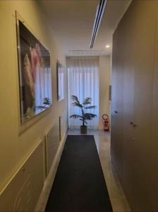 TV a/nebo společenská místnost v ubytování Palazzo Firenze