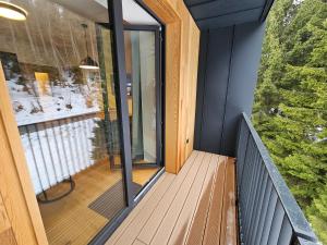 Balkón alebo terasa v ubytovaní Benecko moderní apartmán A30 by AlkaTravel