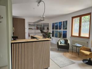 a kitchen with a large island in a room at Garn&igrave; Beniamino in Riva del Garda