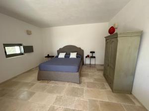 Postel nebo postele na pokoji v ubytování Masseria Fanelli