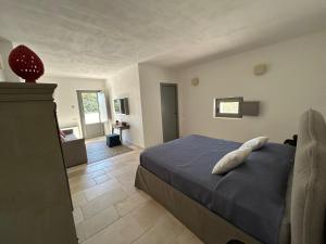 Postel nebo postele na pokoji v ubytování Masseria Fanelli