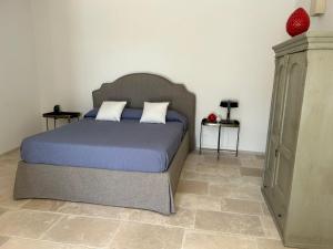 Postel nebo postele na pokoji v ubytování Masseria Fanelli