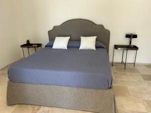 Postel nebo postele na pokoji v ubytování Masseria Fanelli