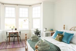 Postel nebo postele na pokoji v ubytování B’s Place Guest House