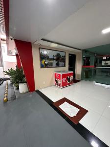TV i/ili multimedijalni sistem u objektu Roraima Apart Hotel