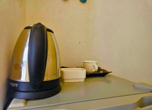 a blender sitting on top of a counter at Wadi Rum Luxure desert Camp in Wadi Rum