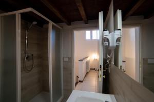 a bathroom with a shower and a sink at Coco Places Apartments Santa Maria Novella, Centro Storico in Florence +40 photos