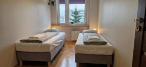 Ένα ή περισσότερα κρεβάτια σε δωμάτιο στο Labo Apartment Ursynów Natolin