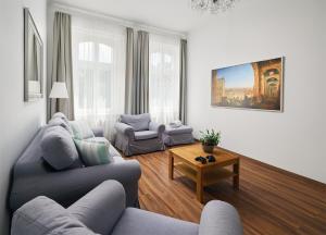 Posezení v ubytování IMPERIAL Apartments