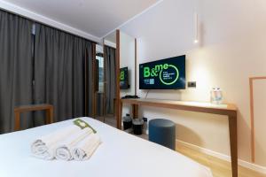 Ένα ή περισσότερα κρεβάτια σε δωμάτιο στο B&B Hotel Quarto d'Altino