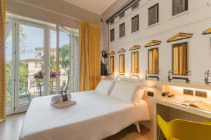 Postel nebo postele na pokoji v ubytování B&B Hotel Treviso
