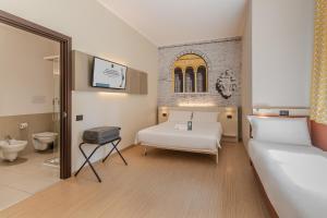 Postel nebo postele na pokoji v ubytování B&B Hotel Treviso