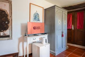 Kuchyň nebo kuchyňský kout v ubytování Casa Museu da Geada - Rural Hotel