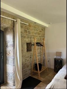Postel nebo postele na pokoji v ubytování Chateau de Lestang