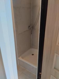 a bathroom with a tub and a shower stall at Domek v přírodě Hradec Králové in Hradec Králové +25 photos